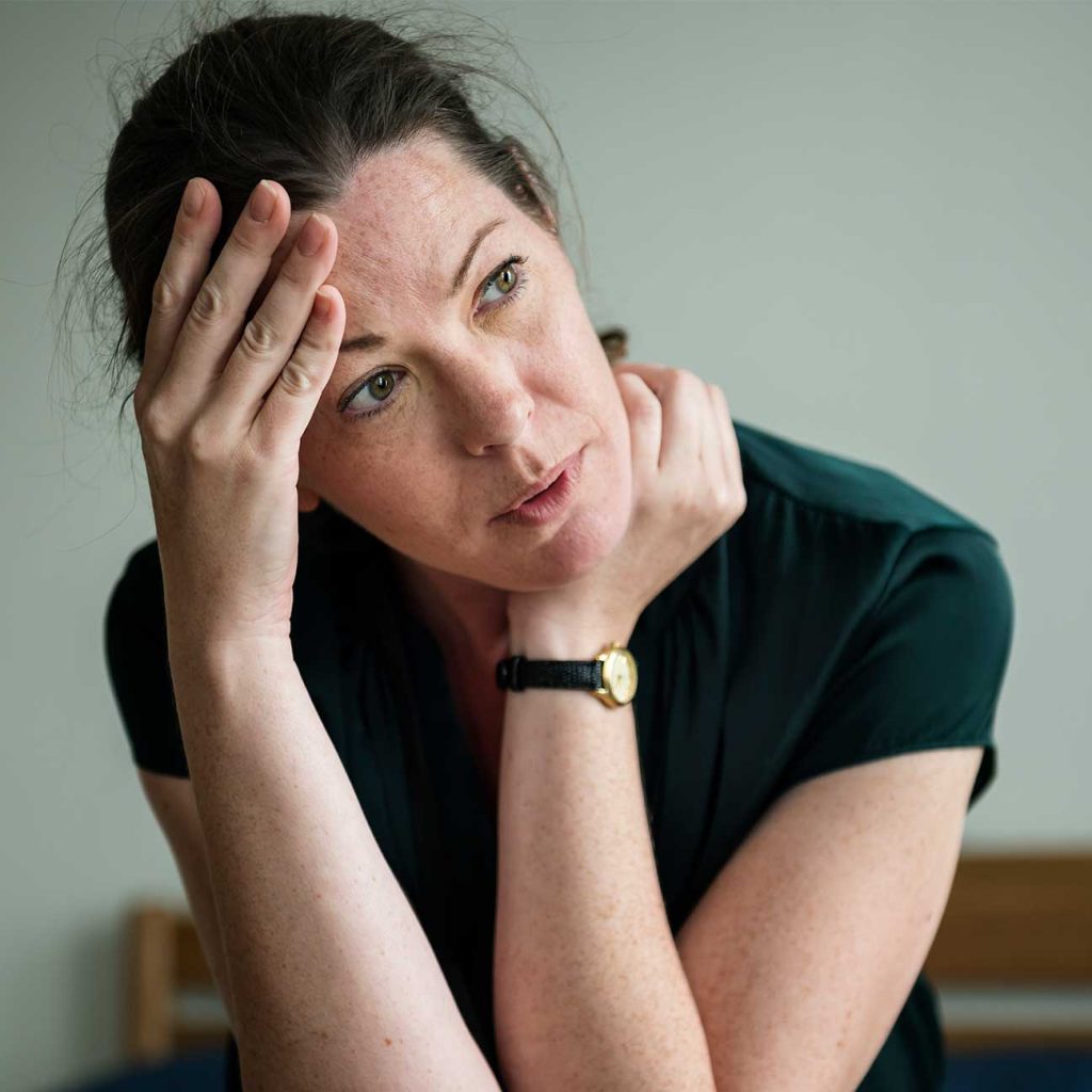 Woman experiencing anxiety, highlighting need for personalised hypnotherapy