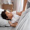 Parent waking child, addressing bed wetting with self-hypnosis