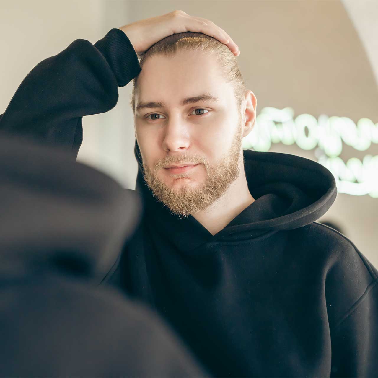 Close-up of man's eyes reflecting self-assurance, achieved through self-hypnosis