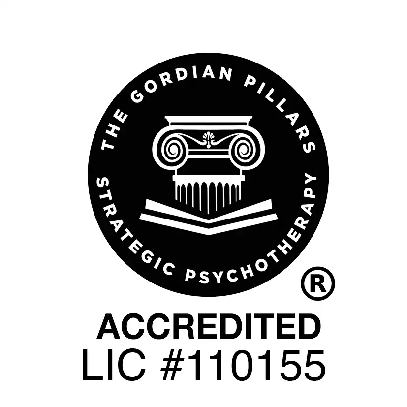 Logo Of The Gordian Pillars Strategic Psychotherapy, Featuring An Ionic Column, With Text &Quot;Accredited Lic #110155&Quot; And A Registered Trademark Symbol.